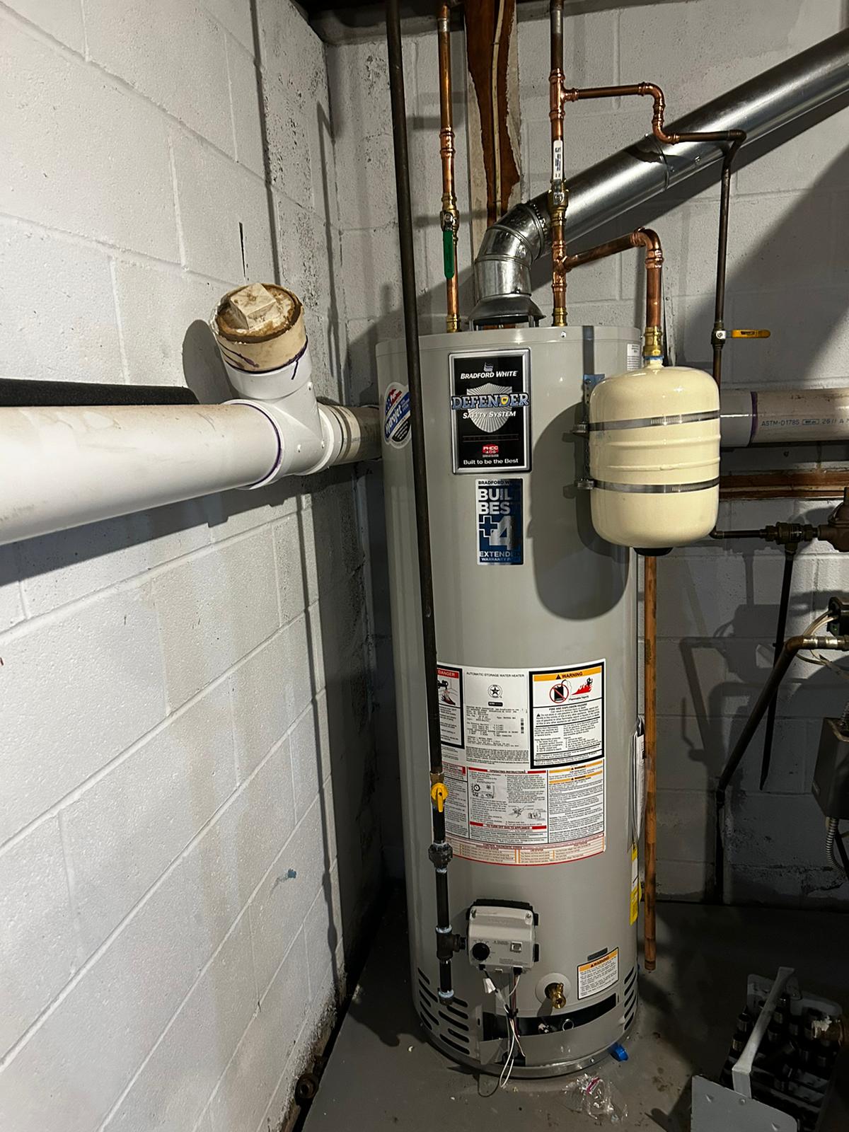 Bradford White gas water heater installed with an expansion tank