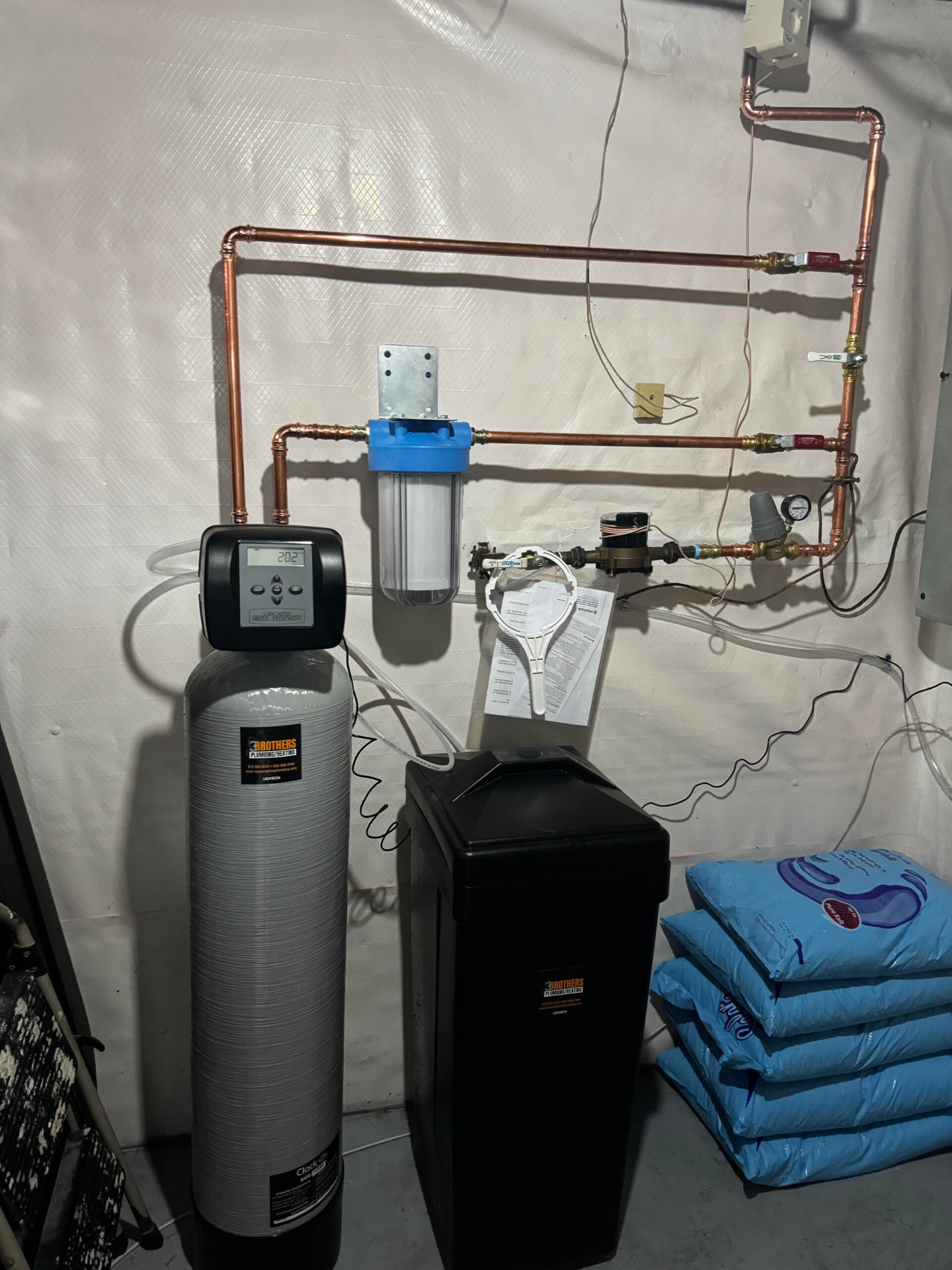 Whole house water softener, filter and brine tank plumbed in copper